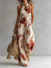 New halter backless jumpsuit, blue and white tie-dye wide-leg pants.