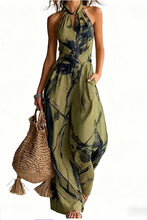 New halter backless jumpsuit, blue and white tie-dye wide-leg pants.