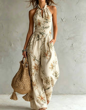 New halter backless jumpsuit, blue and white tie-dye wide-leg pants.