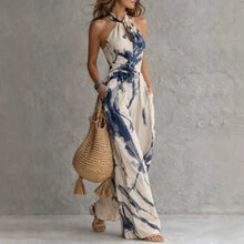 New halter backless jumpsuit, blue and white tie-dye wide-leg pants.